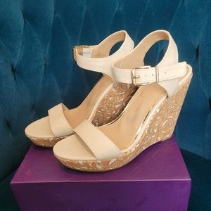 Jessica Simpson wedged heels with floral  design.